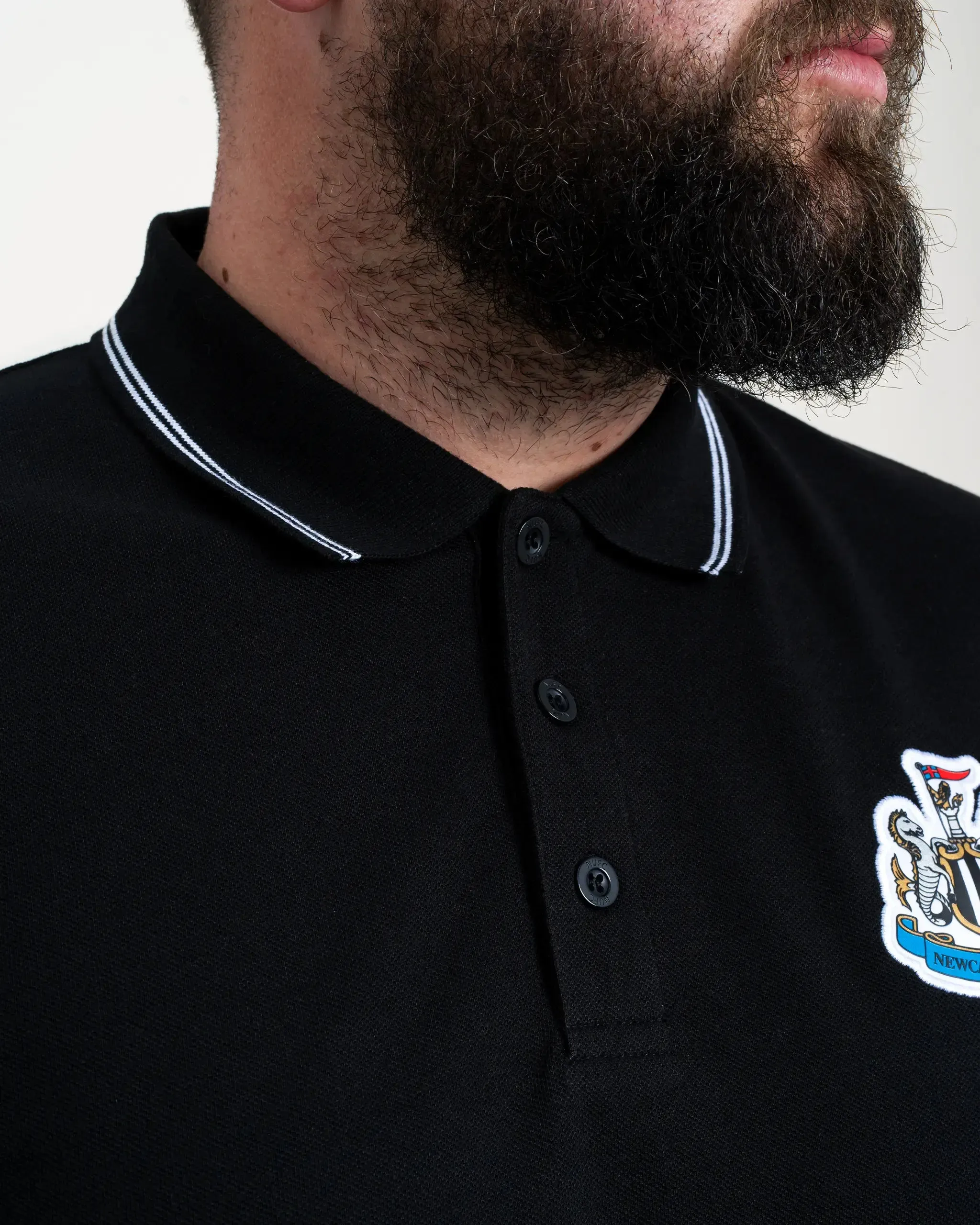 Newcastle United Men's Black Terrace Pique Polo